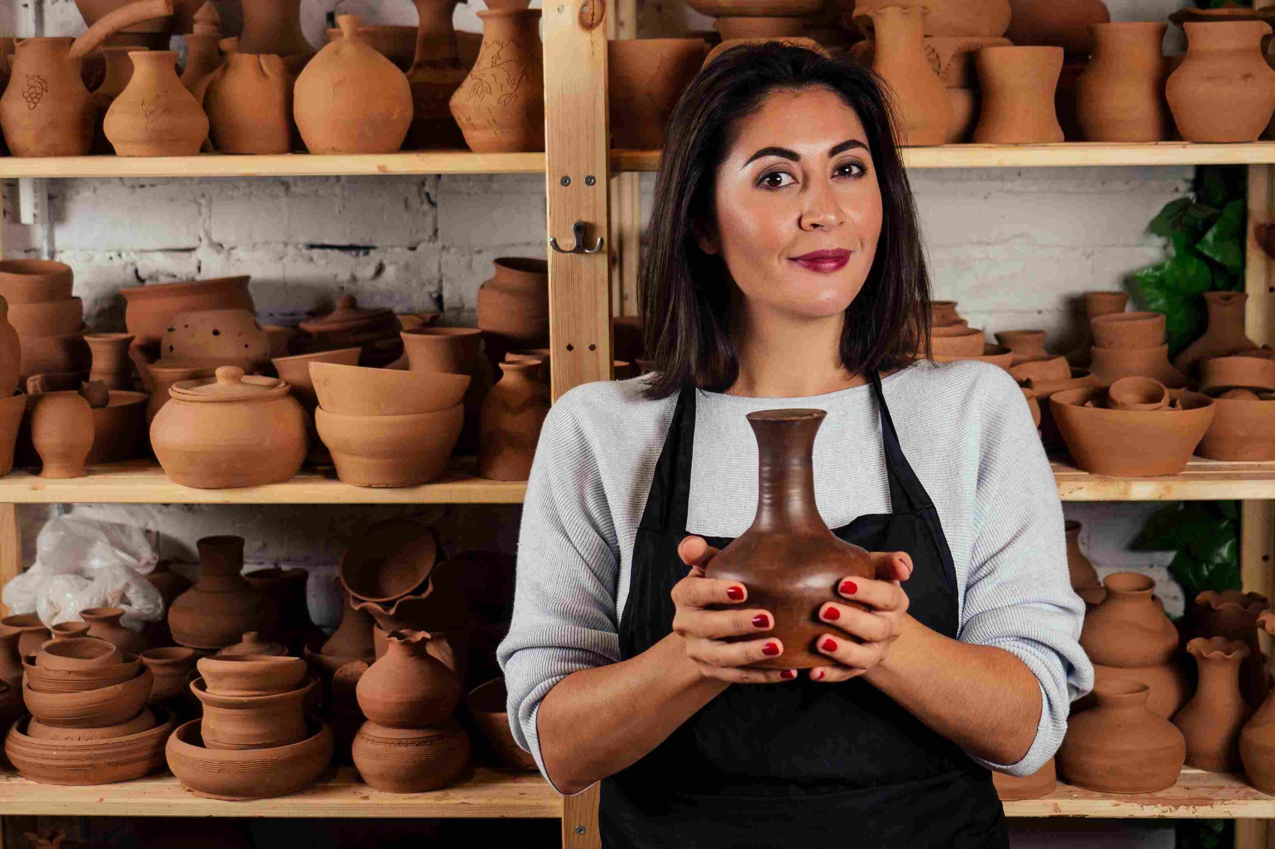 beautiful-potter-master-woman-molds-from-clay-pot-mastre-female-student-sculptor-works-with-clay-potter-s-wheel-table-with-tools-workshop-inspiration-creativity_11zon