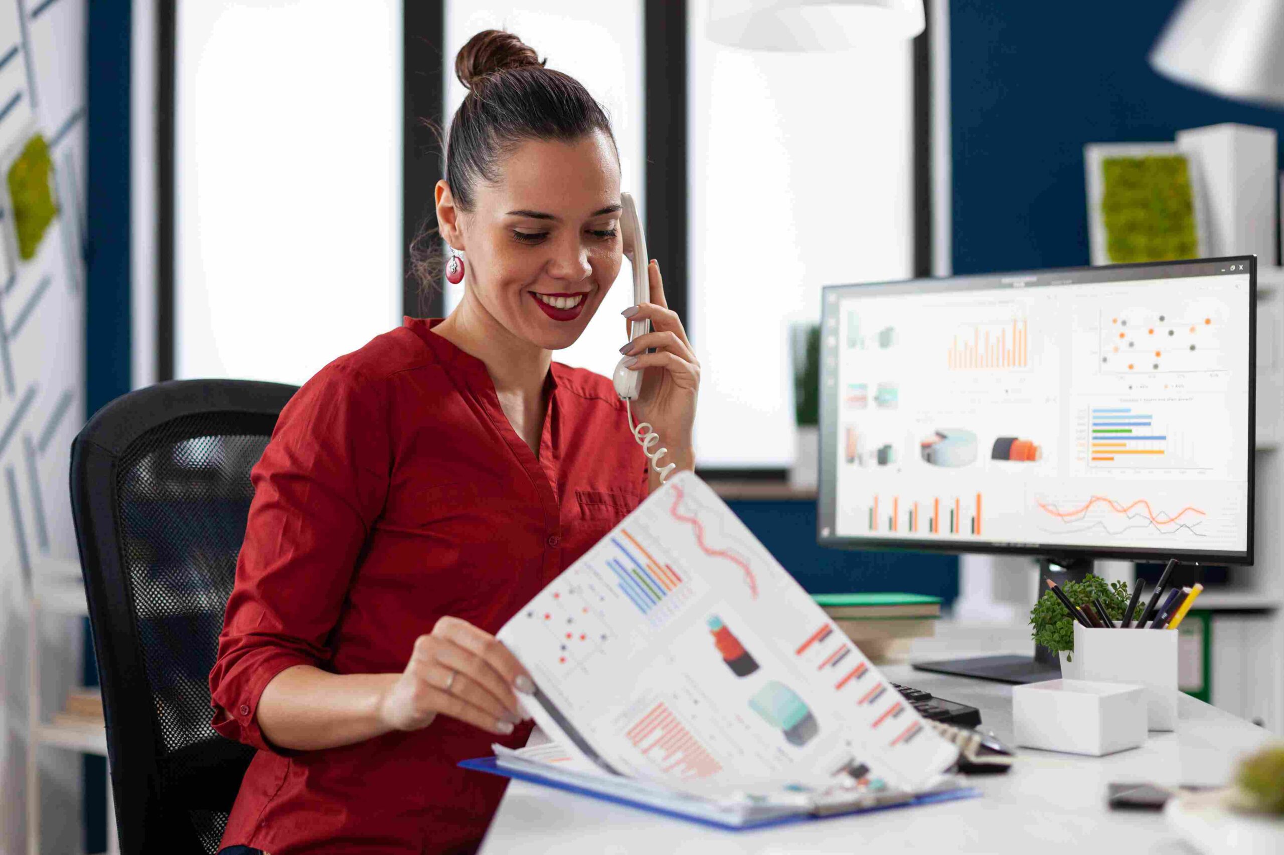 businesswoman-company-office-checking-finaicial-statistics_11zon
